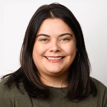 Woman with shoulder-length dark hair