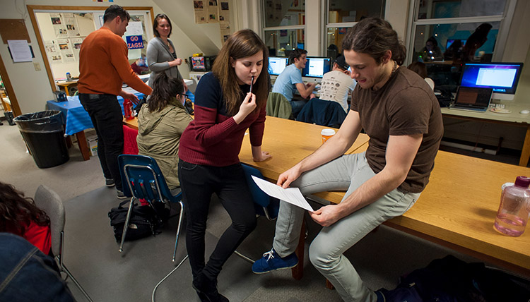 Bulletin page editors review copy changes before the newspaper goes to press. Bulletin page editors review copy changes before the newspaper goes to press.