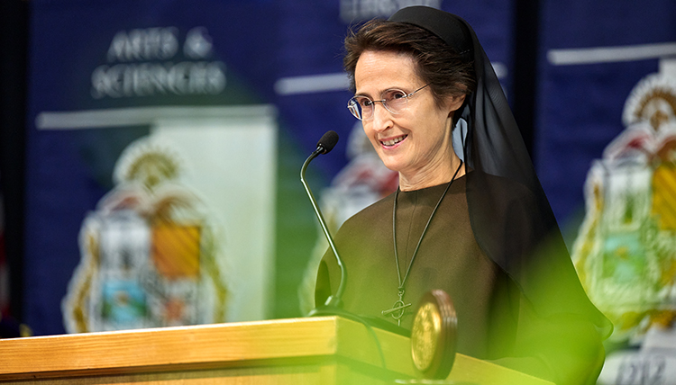 Sister Patrini delivering her keynote address. Sister Patrini delivering her keynote address.