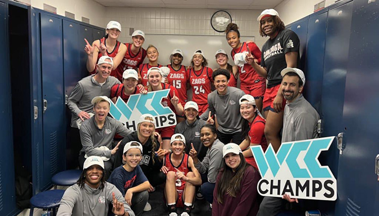 Gonzaga's Women's Basketball team and coaches celebrate being WCC champs in a locker room. Gonzaga's Women's Basketball team and coaches celebrate being WCC champs in a locker room.