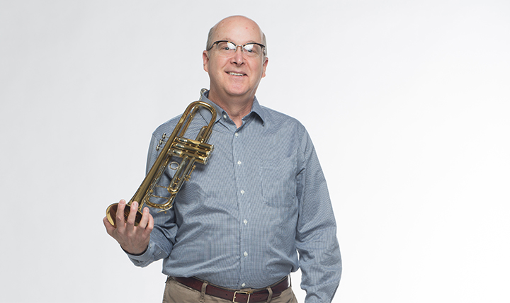 male musician with trumpet male musician with trumpet