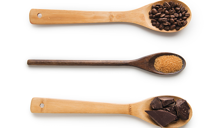 three spoons with coffe sugar and chocolate three spoons with coffe sugar and chocolate