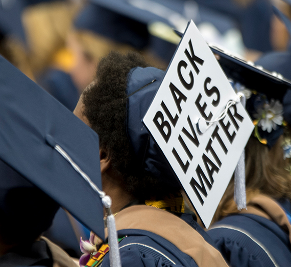 a student's graduation cap reads