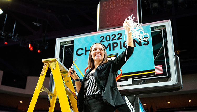 coach lisa fortier cutting the net at the 2022 WCC tourney coach lisa fortier cutting the net at the 2022 WCC tourney