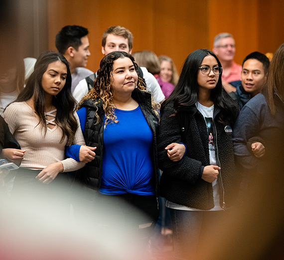 group of students linking arms