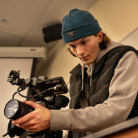 200x200-Gonzaga-University-Student-Film-Fest.jpg A Gonzaga University Integrated Media student filming with a video camera.