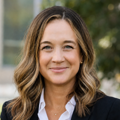 Woman smiles at camera. 
