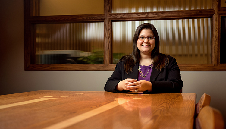 Law Professor Jessica Kiser sits in the Dean's Suite conference room Law Professor Jessica Kiser sits in the Dean's Suite conference room