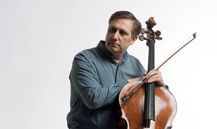 male musician with cello male musician with cello