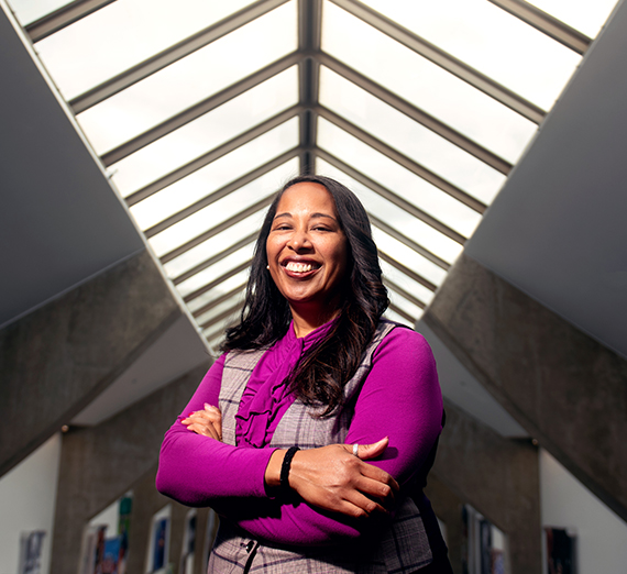 african american woman in bright magenta shirt