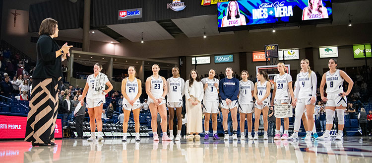 lisa-fortier-st-marys-game Gonzaga Women's Basketball Coach Lisa Fortier with the team at a game with St. Mary's game.