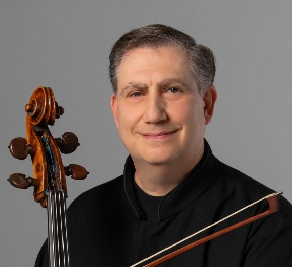 Image of Kevin Hekmatpanah with a Cello