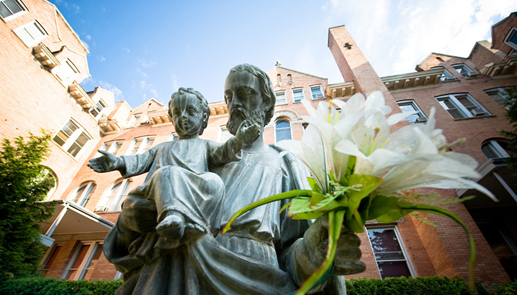 Statue of St. Joseph holding Jesus Statue of St. Joseph holding Jesus