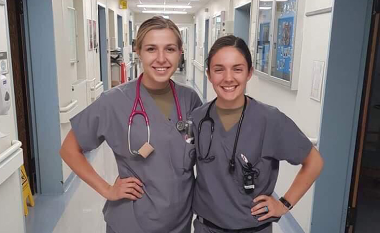 Nurses Garosi and Yingling pose for a photo in a hospital in Germany Nurses Garosi and Yingling pose for a photo in a hospital in Germany