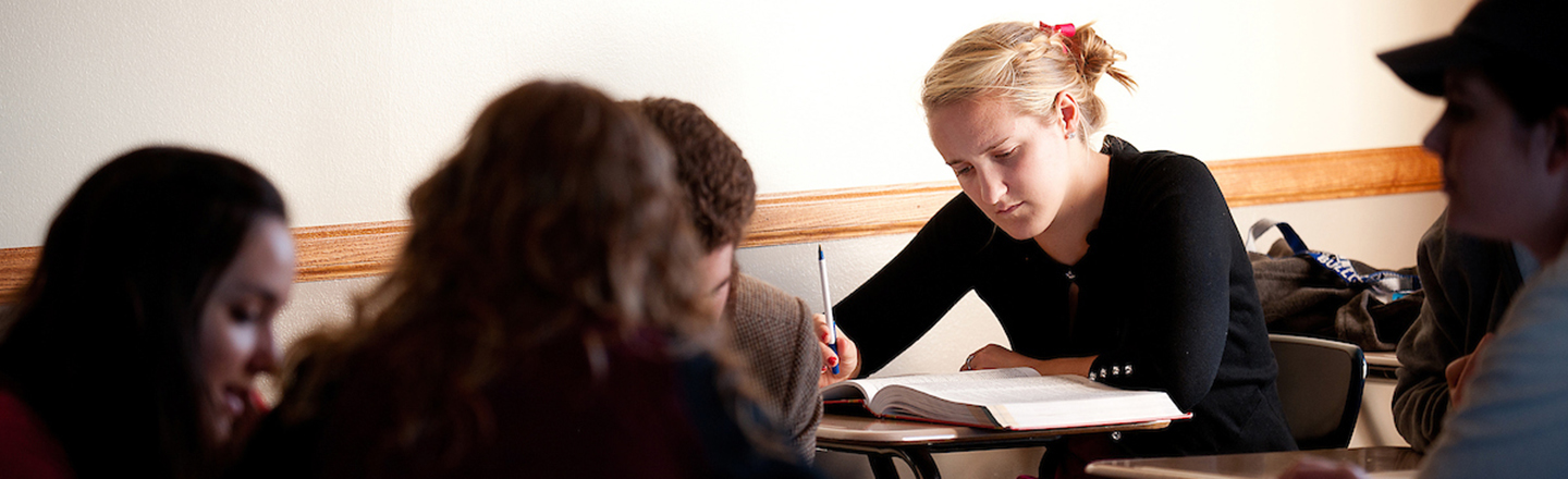 Students work together in the classroom.