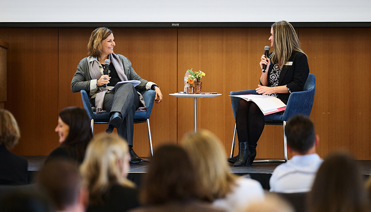 Dr. Passerini answering questions on stage at the Women Lead Luncheon. Dr. Passerini answering questions on stage at the Women Lead Luncheon.