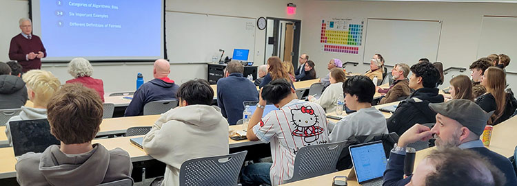 Dr Quinn presents his lecture to Gonzaga students and faculty Dr Quinn presents his lecture to Gonzaga students and faculty