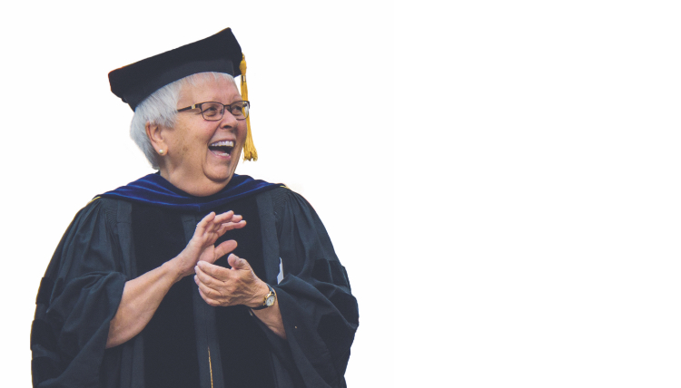 sister joy milos in cap and gown laughing sister joy milos in cap and gown laughing