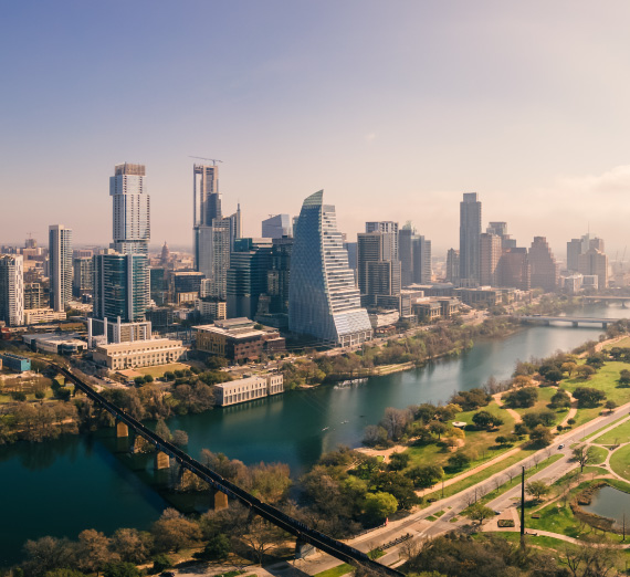 Downtown Austin, Texas with a river in the foreground.