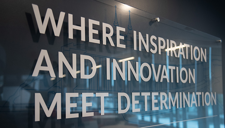 A plaque that reads: Where Inspiration and Innovation meet Determination. A plaque that reads: Where Inspiration and Innovation meet Determination.
