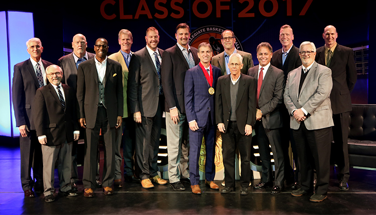 Group of basketball players from teams of Gonzaga's past line up for a photo with John Stockton Group of basketball players from teams of Gonzaga's past line up for a photo with John Stockton