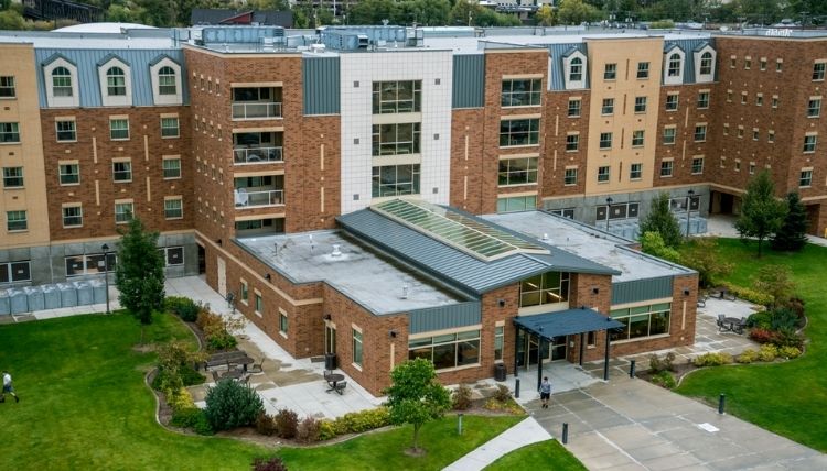 A photo of the front of Coughlin Hall, shot from a drone. A photo of the front of Coughlin Hall, shot from a drone.