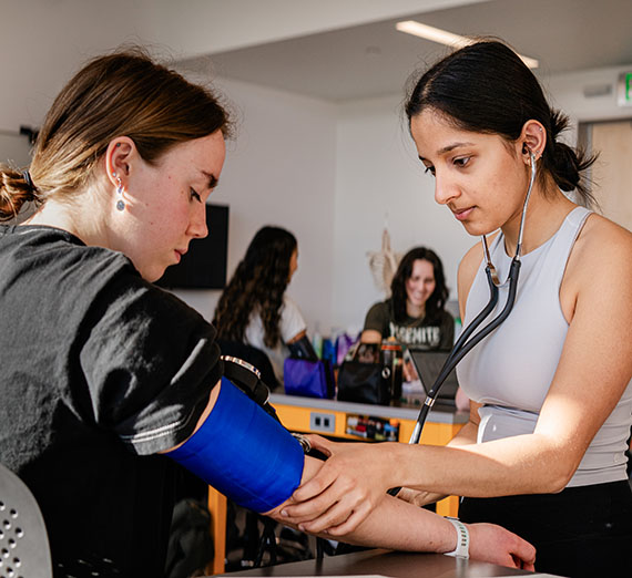 Nursing Students checking blood pressure
