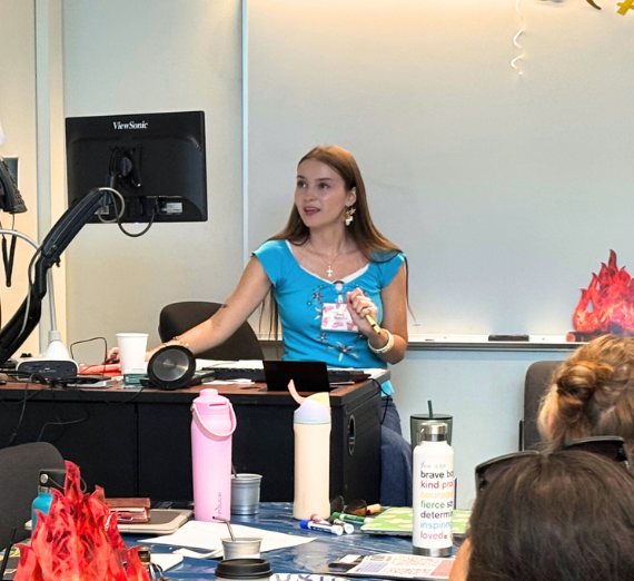 A student leads an orientation session
