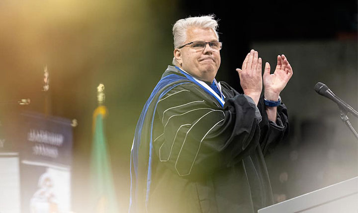 Robert McCann gave the commencement address and was awarded the DeSmet Medal. Robert McCann gave the commencement address and was awarded the DeSmet Medal.
