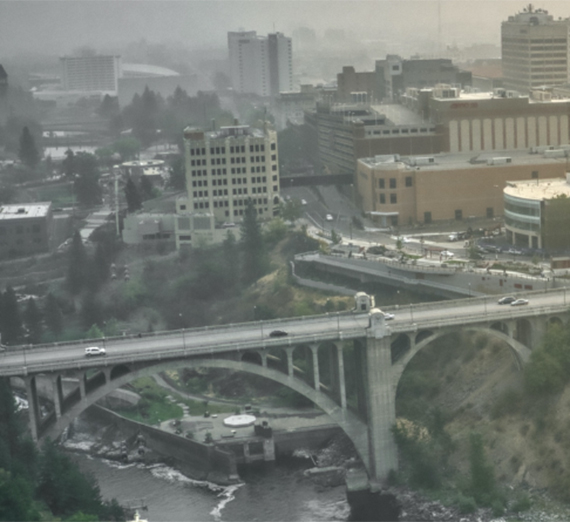 The Spokane city skyline enveloped in wildfire smoke
