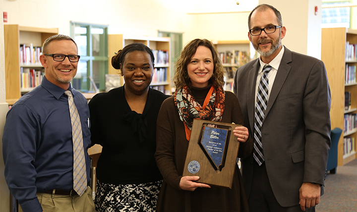 Pilar Biller poses after receiving her Teacher of the Year award. Pilar Biller poses after receiving her Teacher of the Year award.