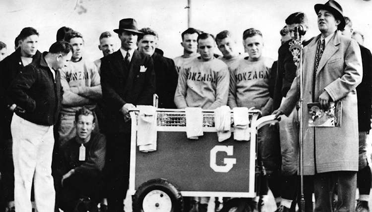 Bing Crosby stands with Gonzaga football team Bing Crosby stands with Gonzaga football team