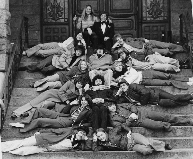 body-students-sitting-on-stairs-gold-club A group of students sitting on the steps of College Hall.