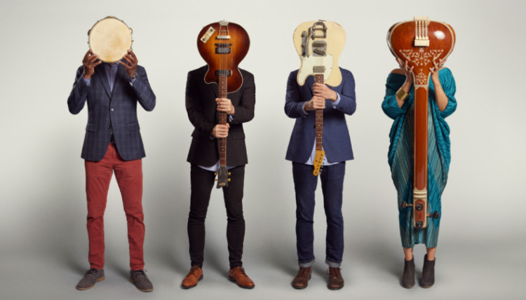 American-Patchwork-Quilt_Instrument-Head-Poster_Photo-by-Matt-Carr_2-750x428.jpg Members of the band American Patchwork Quilt with their instruments over their faces.