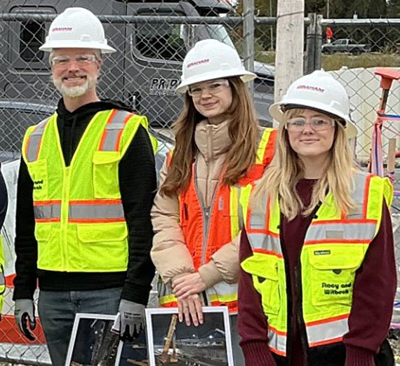 Dr Musinski and two civil engineers on a construction site