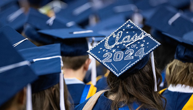 A graduation cap decorated with the words Class of 2024 A graduation cap decorated with the words Class of 2024