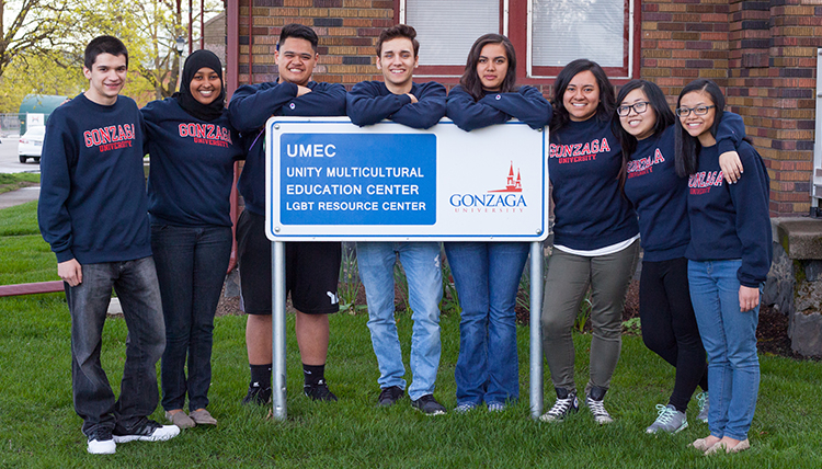 Members of the 2015 ActSix cohort gather in front of the original Unity House. They are: Henadz Krukovich (’19), Hawa Elias (married name?) (’19), Joseph Allen Jerome (’19), Loren Carrillo (’19), Siniva (Areta) Menso (’19), Eloisa Serrano (no grad year), Kathy Au (’19) and Jennifer Phan (’19). Members of the 2015 ActSix cohort gather in front of the original Unity House. They are: Henadz Krukovich (’19), Hawa Elias (married name?) (’19), Joseph Allen Jerome (’19), Loren Carrillo (’19), Siniva (Areta) Menso (’19), Eloisa Serrano (no grad year), Kathy Au (’19) and Jennifer Phan (’19).