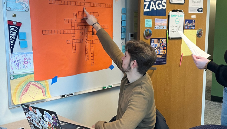 Special Education student works on crossword puzzle as a review game Special Education student works on crossword puzzle as a review game