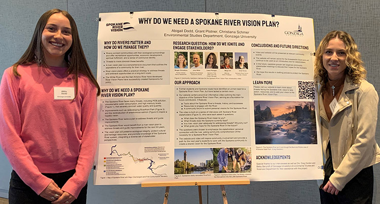 Abby Dodd and Christiana Schmer stand beside the Spokane River Vision Plan poster board. Abby Dodd and Christiana Schmer stand beside the Spokane River Vision Plan poster board.