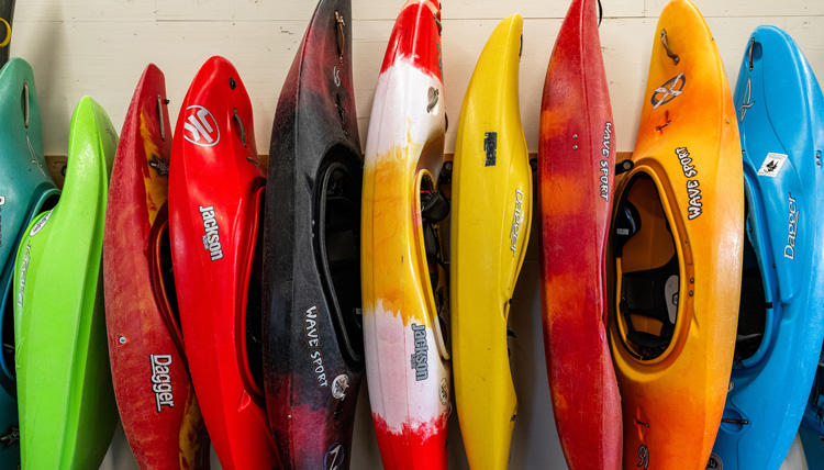 GU Outdoors kayaks in their new space.