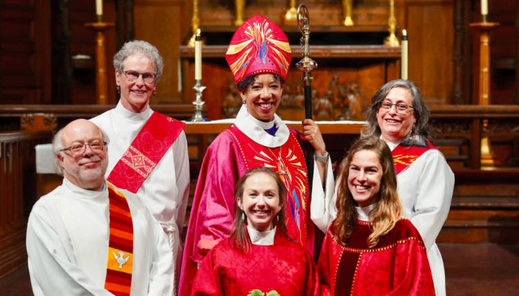 Group of religious leadership, including Reverend Amanda Newell Large and Bishop. Group of religious leadership, including Reverend Amanda Newell Large and Bishop.