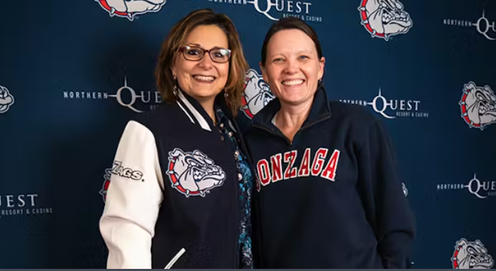 President Passerini poses with Professor Peggy Sue Loroz at the premiere of President Passerini poses with Professor Peggy Sue Loroz at the premiere of