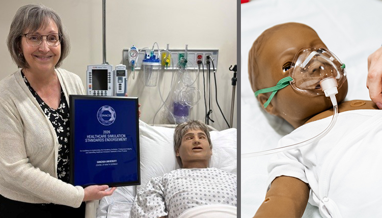 woman with plaque next to simulation manequin