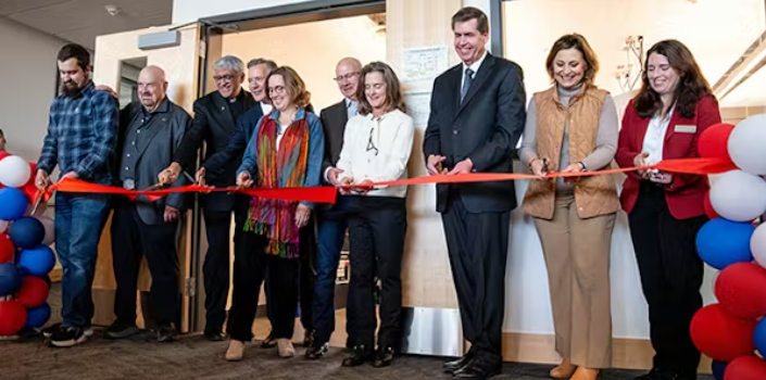 Line of people behind ribbon cutting for Patrick Ferro Center for Materials Research opening Line of people behind ribbon cutting for Patrick Ferro Center for Materials Research opening