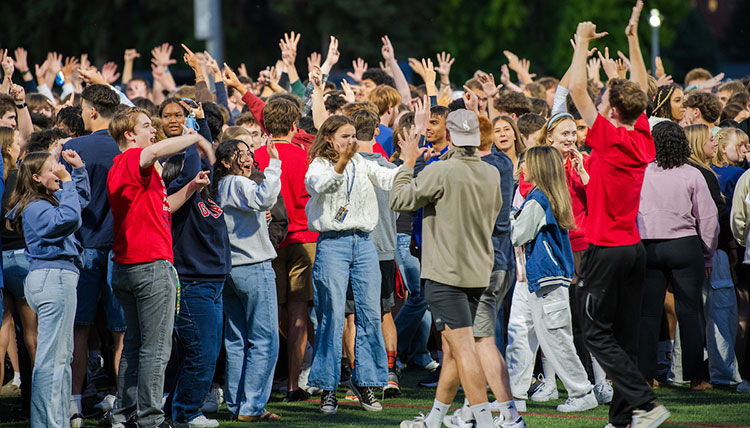 A pack of students cheer at Play Fair A pack of students cheer at Play Fair
