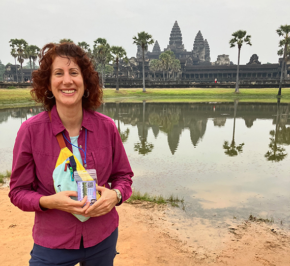 Professor Juliane Mora standing in front of a river