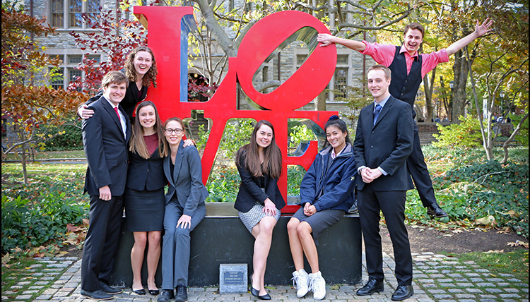 Gonzaga Mock Trial students gathered around a public art piece with letters that spell the word love. Gonzaga Mock Trial students gathered around a public art piece with letters that spell the word love.