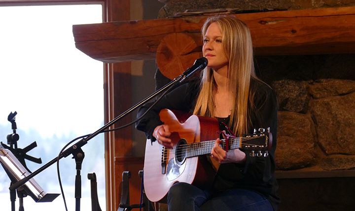 female singer songwriter Nicole Lewis with guitar female singer songwriter Nicole Lewis with guitar