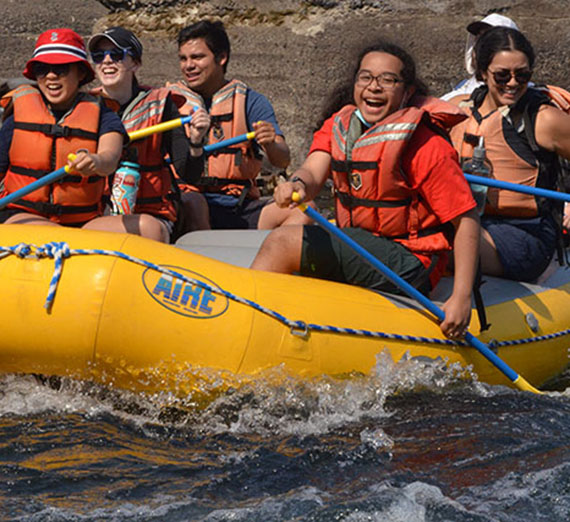 people on raftboat