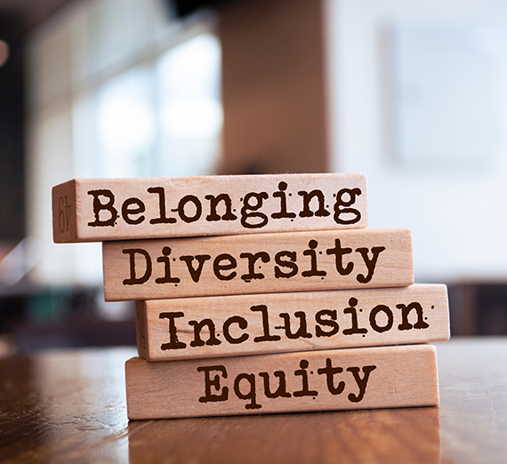 wood blocks that say equity and inclusion